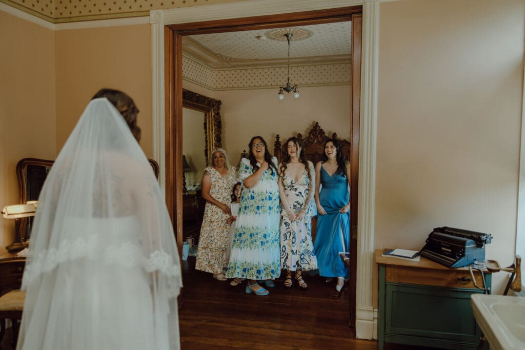 Brides first look with family.
Denver Wedding Venue