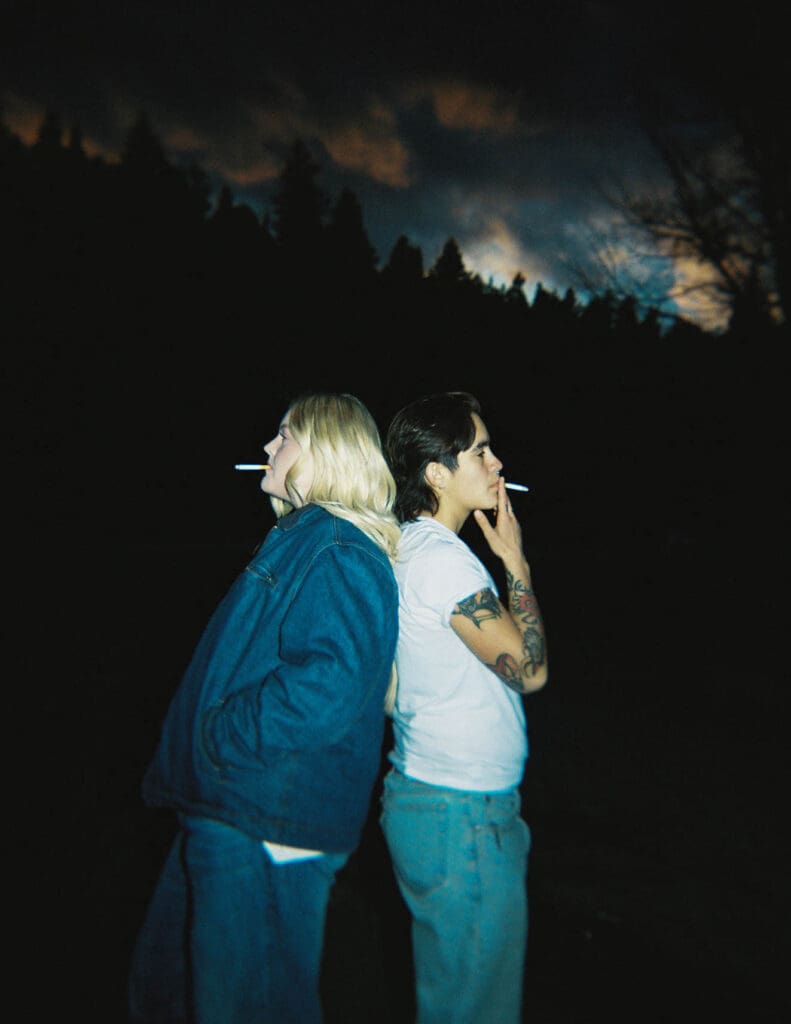 couple smoking a cigarette at their engagement session