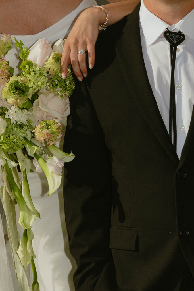 floral and ring details on wedding day 