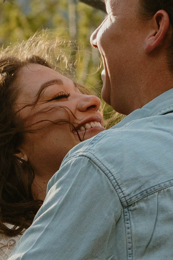 detail of womans face smiling during engagement photo session