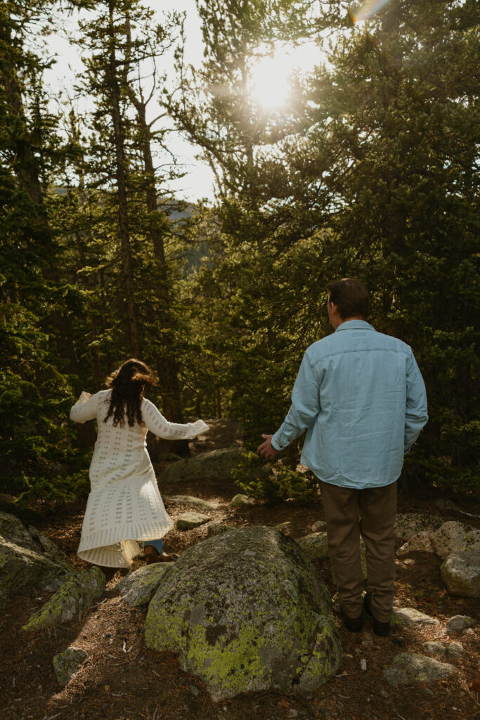 man and woman exploring during engagement session