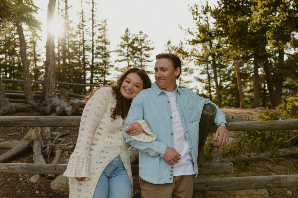 couple smiling at camera at echo park engagement session