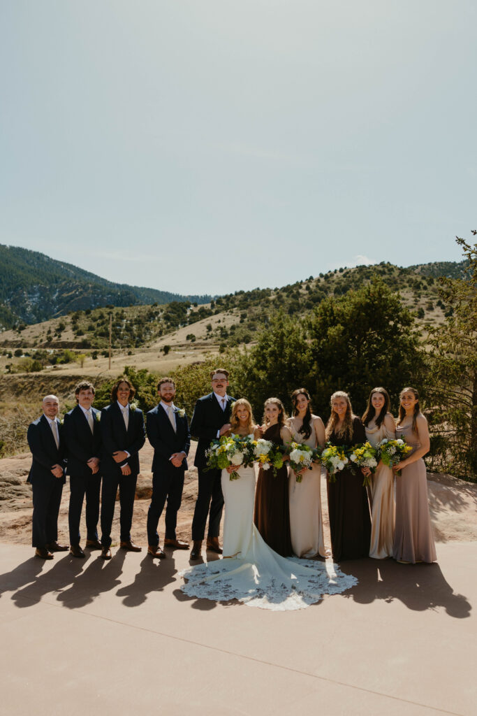 bride, groom and bridal party on wedding day
