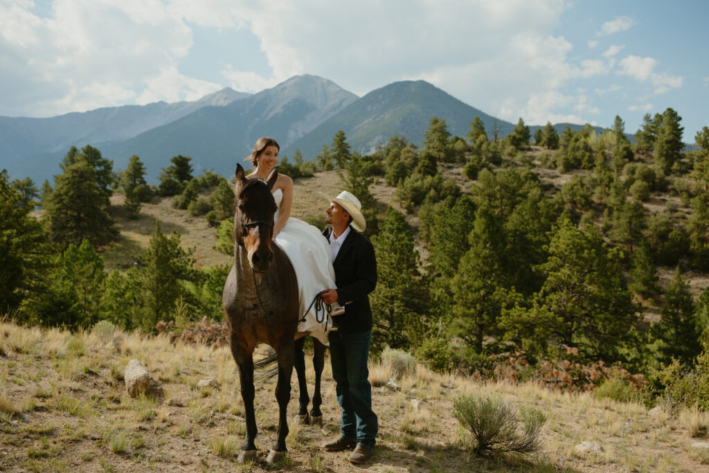 bride and groom portraits with horse