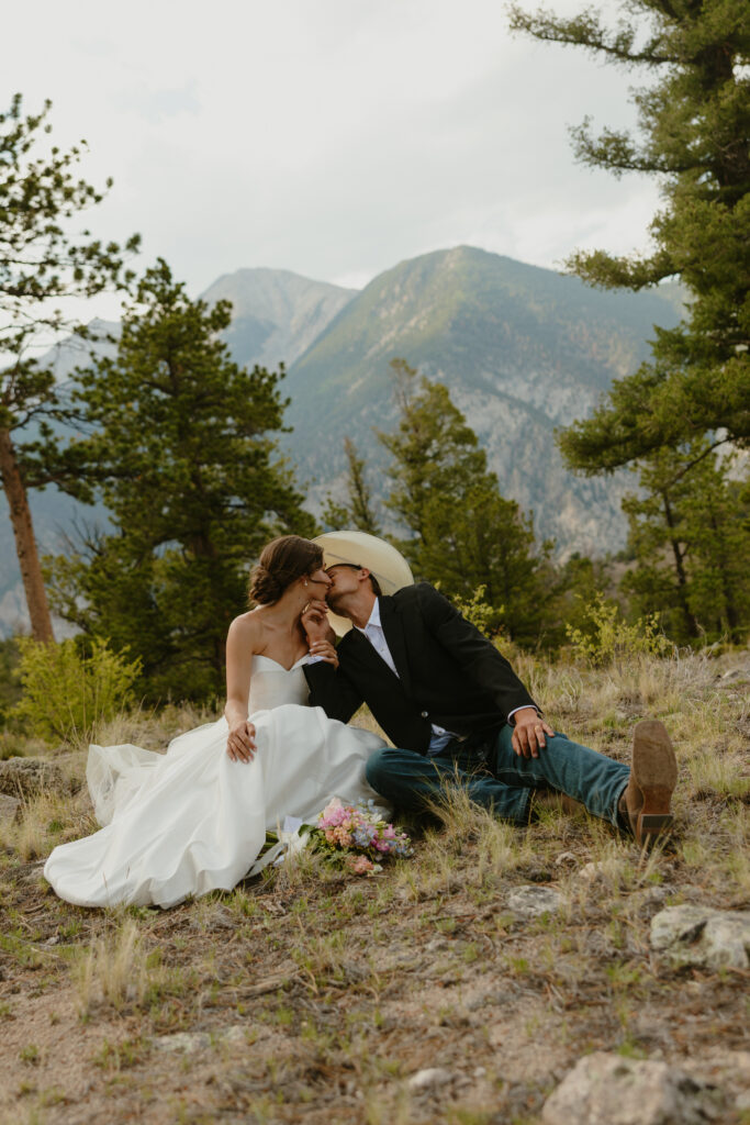 bride and groom portraits with mt Princeton behind